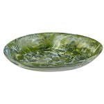 The Nashi Home Serveware Collection, Forest features a shallow, round resinware plate with a marbled green and white pattern and glossy finish—a stylish accent for your home.