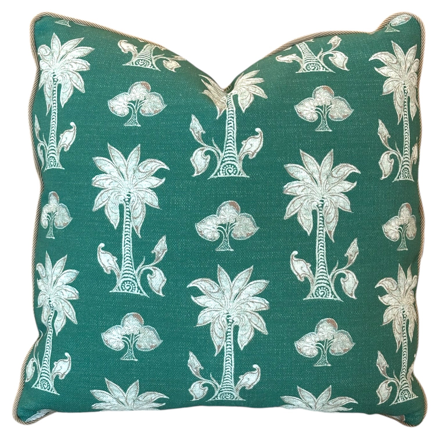 The Mazari Palm Outdoor Pillow features a green square design with white tropical palm tree and bird patterns on weather-resistant fabric, adding style and comfort to your outdoor space. Shown on a plain white background.