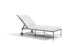 The Amalfi Chaise Lounge features a metal frame, white cushioned seat and backrest, partial recline, and two small wheels—making it a perfect and stylish choice for poolside relaxation.