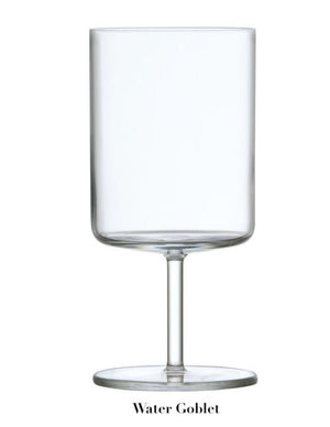 A clear, cylindrical water goblet with a stem and flat base, crafted from TRITAN® Crystal Glass, embodying a Mid-Century Modern design from the Fortessa Modo Collection.