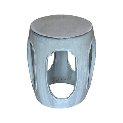 The White Ming Style Garden Stool features a round, light gray metal design with a solid top and four large oval cutouts, adding an antique charm to your space—ideal for those seeking unique rustic stools.