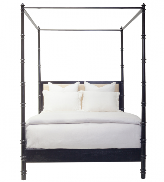 A black Willa Raffia Bed, King with turned bedposts and a white bedding set, including pillows and a duvet.