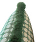 Close-up of a green fabric with white circular patterns and a raised, shaggy green strip running vertically down the center—featured on the Boheme Outdoor Lumbar Pillow, designed with plush polyester fill and a hidden zipper closure for a seamless finish.