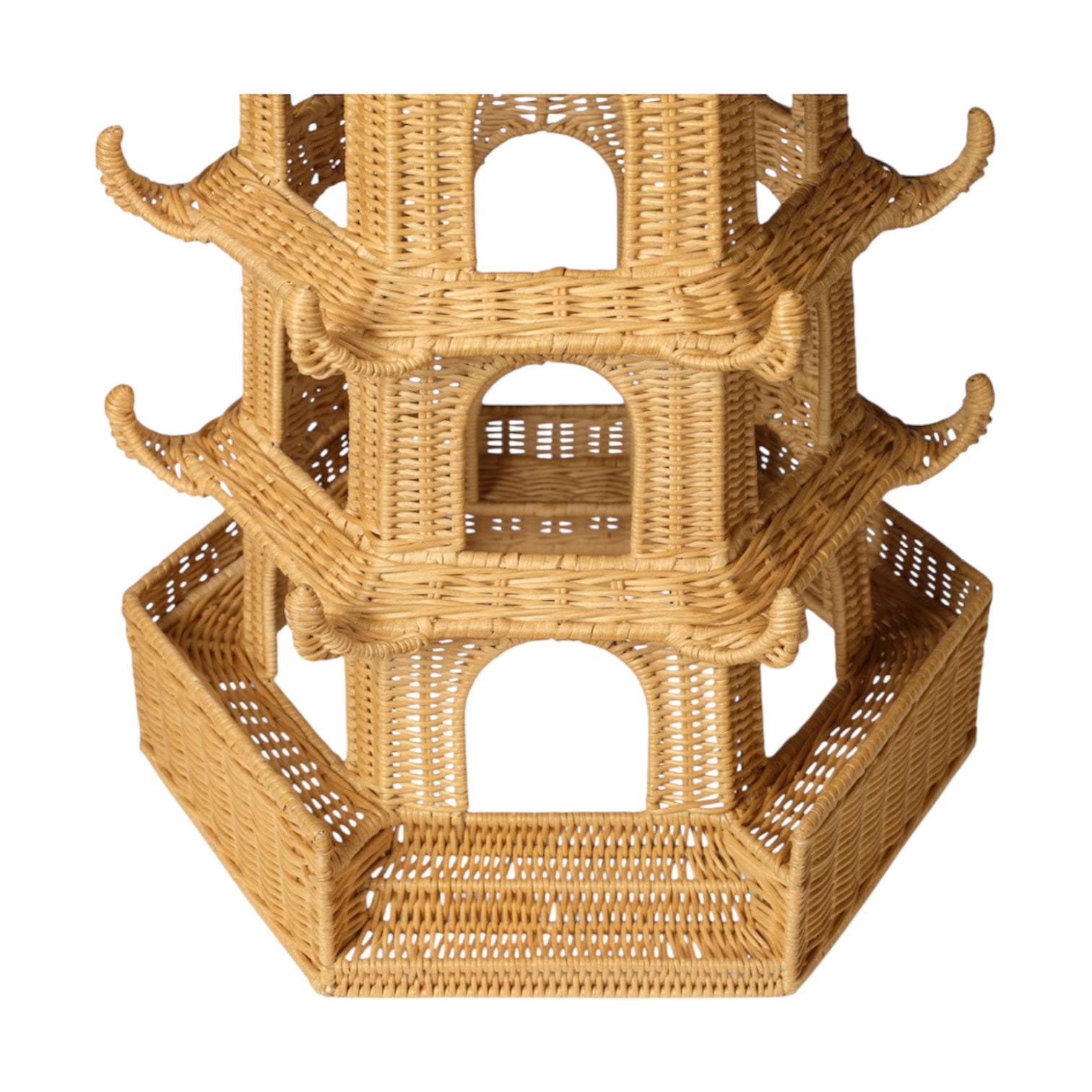 Close-up of the Bardot Pagoda in Light Honey Rattan, featuring multiple arched openings and tiered roofs inspired by traditional Thai designs.