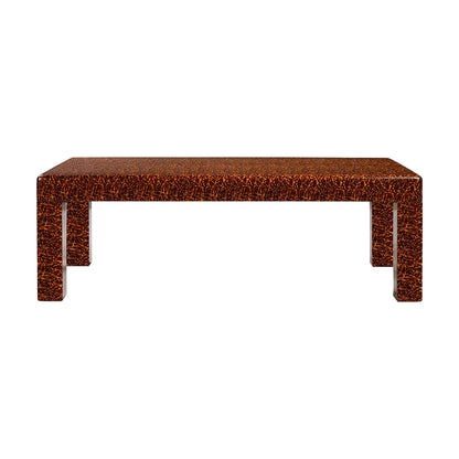 The Bradford Coffee Table features a rectangular design with a textured brown and black faux tortoise shell surface and straight legs, ideal for enhancing your home decor. Shown on a white background.