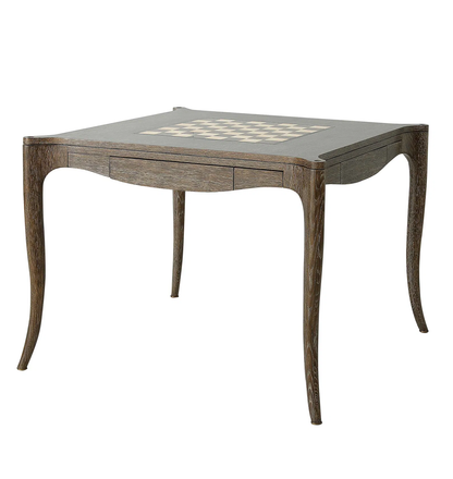 The Bembridge Games Table in Dark Oak is a stylish wooden piece with elegant curved legs and a built-in chessboard—perfect for any games table collection.