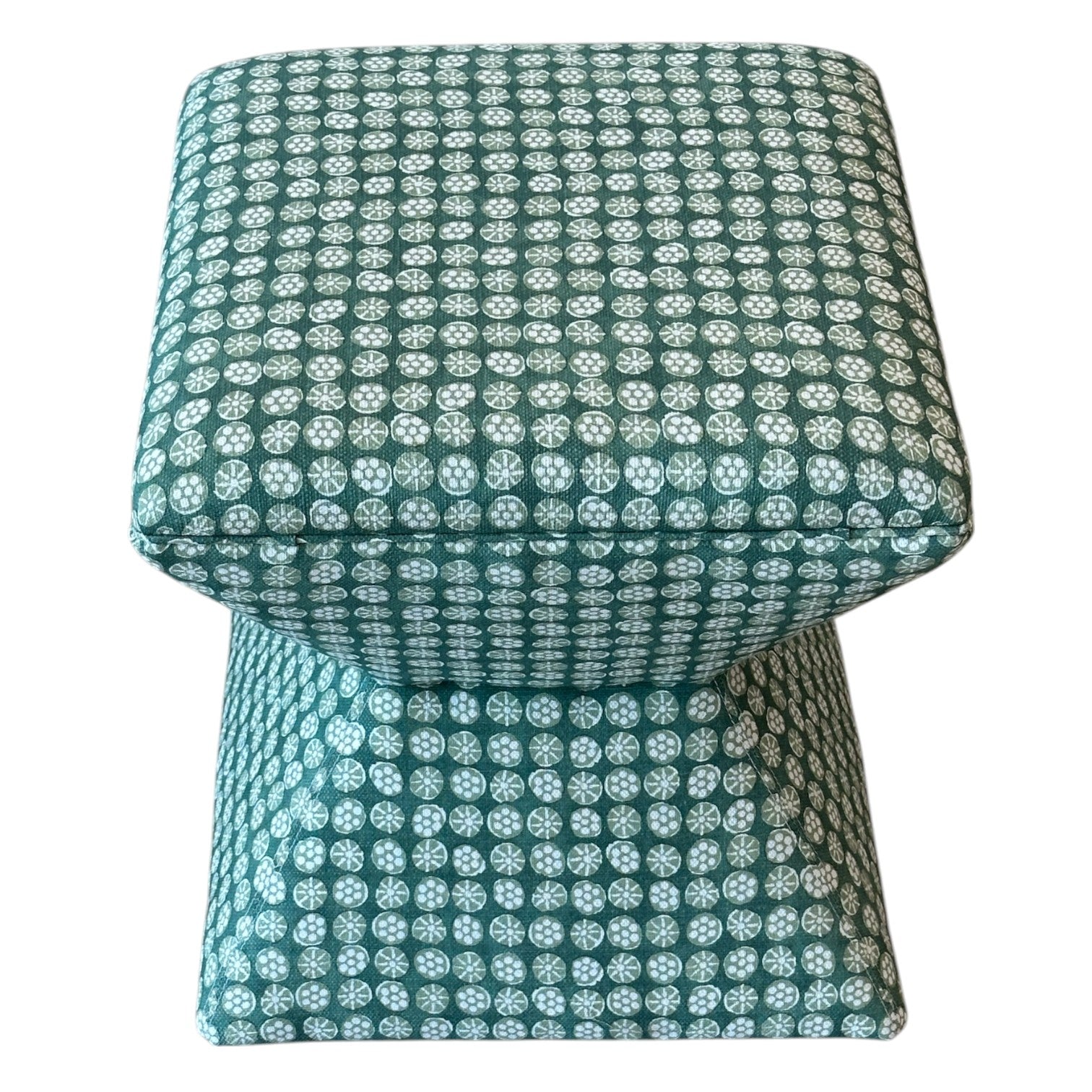The Hamilton Outdoor Ottoman in Boheme Green features a square upholstered design with a teal and white geometric pattern, a wide top, and narrow base—ideal for enhancing your patio decor.