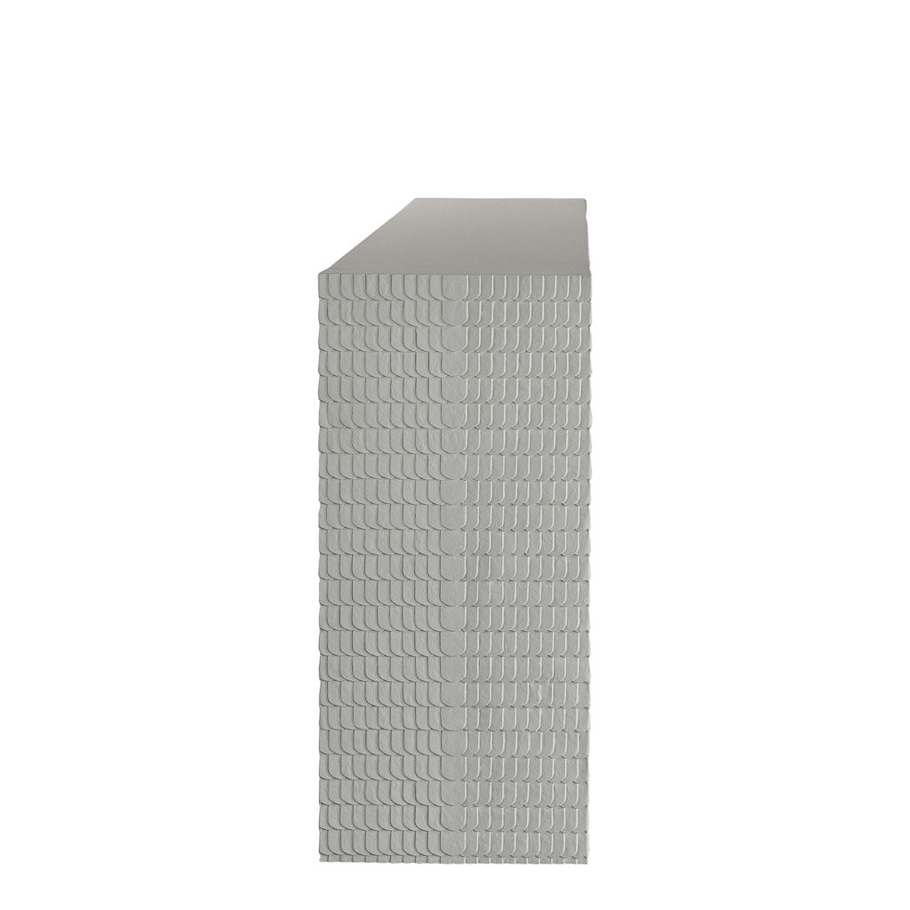 Side view of the Lance Console Table, a rectangular light gray piece with a repeating textured pattern similar to white gesso, shown against a plain white background for a minimalist look.