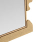 This close-up captures the asymmetrical design of the Zayden Mirror, featuring a rectangular shape with a frame made of wood and textured fabric, beautifully highlighting the corner detail.