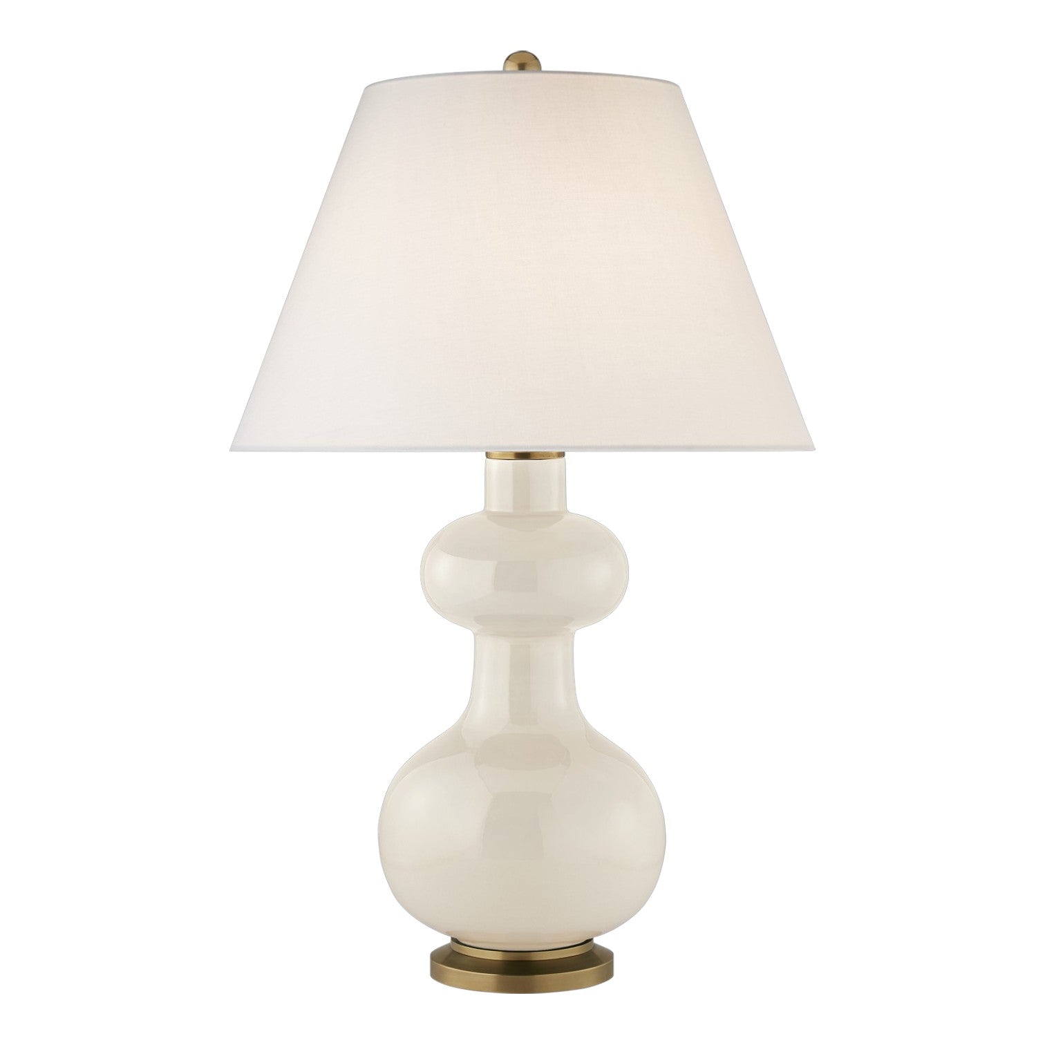 The Chambers Medium Table Lamp features a glossy cream ceramic base, a white tapered fabric shade, and a round brass base—an elegant choice for contemporary interiors.