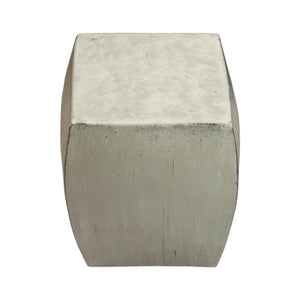 The Solid Square Stool in White features a slightly curved surface and square top, reminiscent of rustic stools, set against a white background.