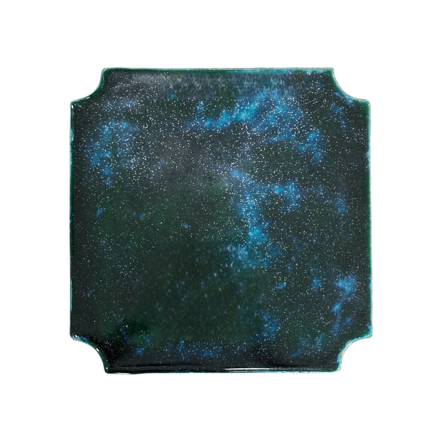 The Turquoise Square Garden Stool has a rectangular shape with subtly indented corners, a dark green base, and blue speckles that evoke the vintage ceramic charm of traditional dragon kiln firing.