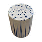 The Cylinder Stool in White and Blue Glaze features a white base, dark blue side streaks, and blue top spots, offering an antique look inspired by traditional dragon kiln ceramic craftsmanship.