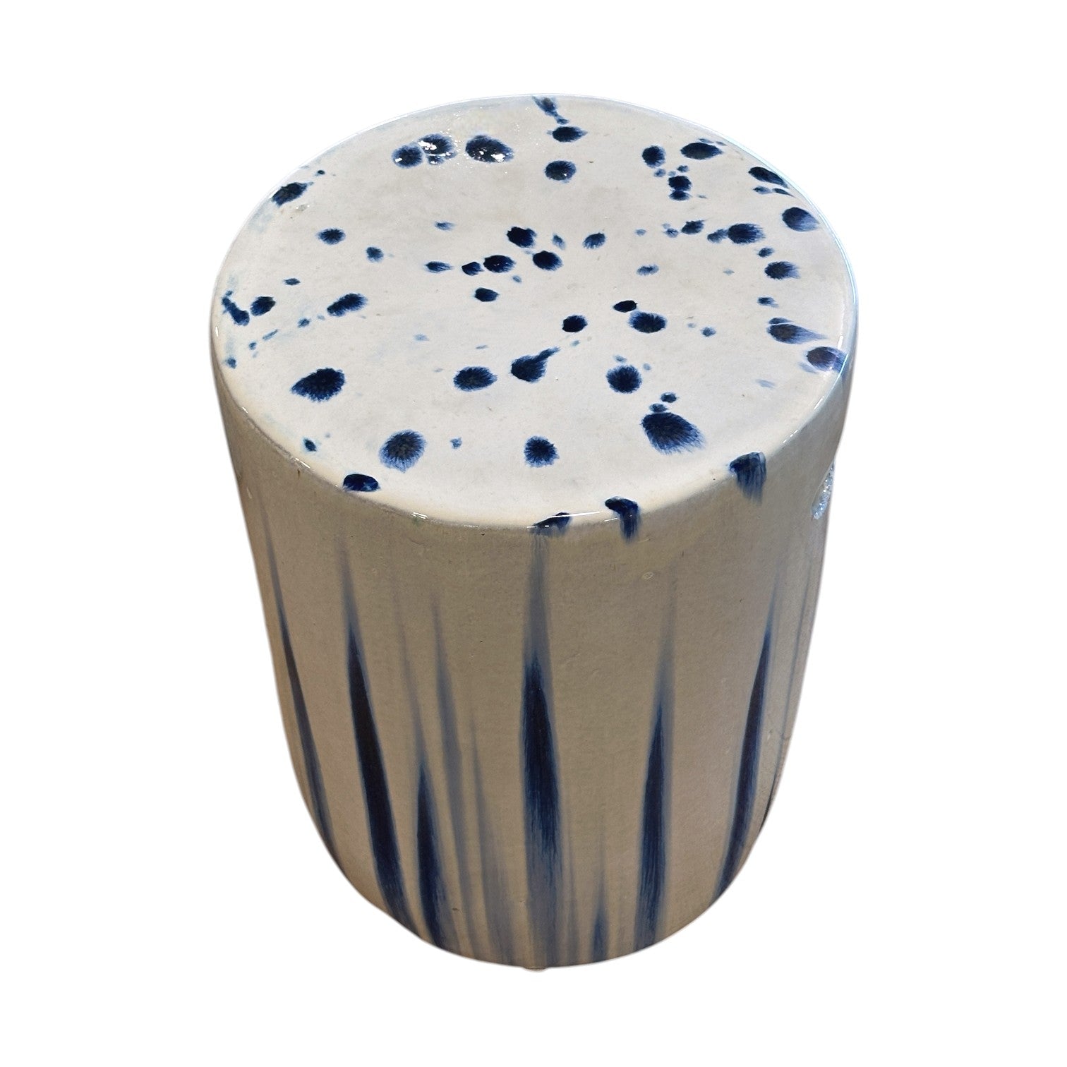 The Cylinder Stool in White and Blue Glaze features a white base, dark blue side streaks, and blue top spots, offering an antique look inspired by traditional dragon kiln ceramic craftsmanship.