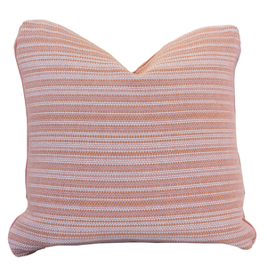 The Avia Terracotta Pillow is a 22x22 square throw pillow featuring a textured pattern of horizontal orange and white stripes on a crisp white background, adding a vibrant accent to any space.
