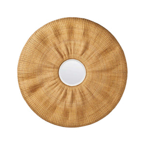 The Larkin Rattan Mirror features a round shape and wide woven rattan frame, perfect for adding bohemian flair to your decor. Photographed on a white background.